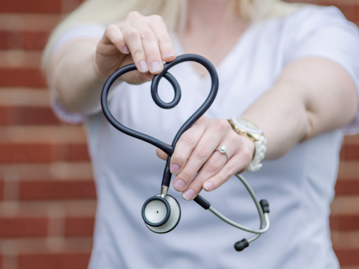 doctor holding stethoscope